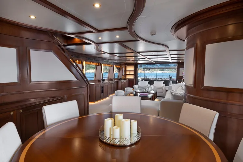 Hag Yacht Photos Pics Luxurious interior of 2007 Custom Line Navetta 30 yacht with elegant wood paneling and seating.