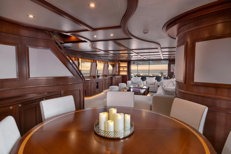 Hag Yacht Photos Pics Luxurious interior of 2007 Custom Line Navetta 30 yacht with elegant wood paneling and seating.