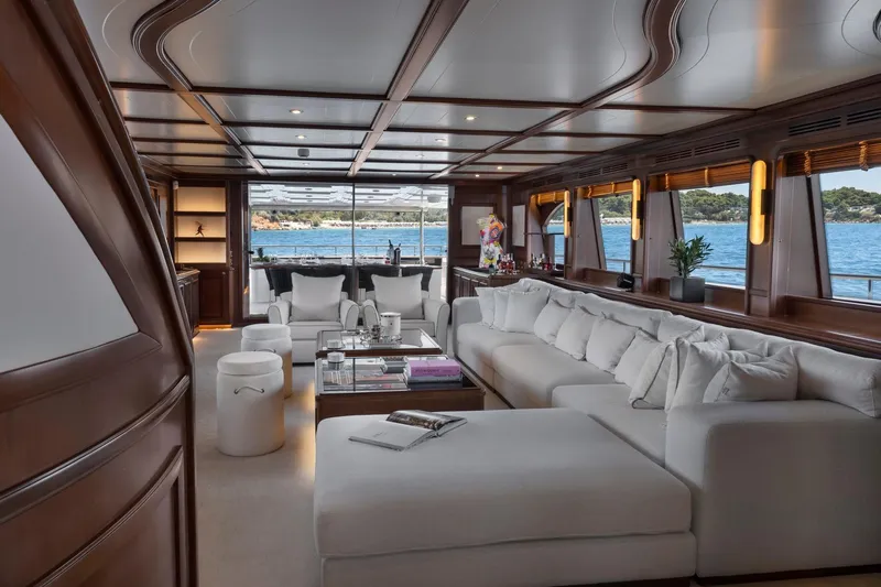 Hag Yacht Photos Pics Luxurious interior of 2007 Custom Line Navetta 30 yacht with elegant seating and ocean view.