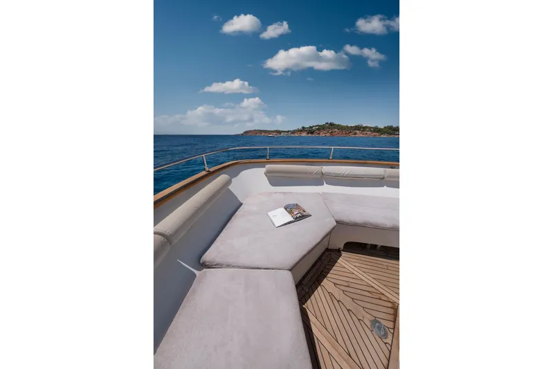 Hag Yacht Photos Pics Luxurious seating area on 2007 Custom Line Navetta 30 yacht with ocean view.