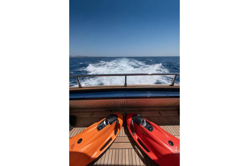 Hag Yacht Photos Pics Custom Line Navetta 30 yacht deck with sea scooters, ocean view, 2007 model.