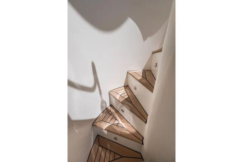 Hag Yacht Photos Pics Wooden staircase with geometric design on Custom Line Navetta 30 yacht, 2007 model.