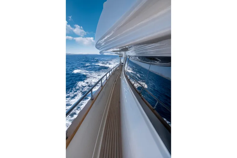 Hag Yacht Photos Pics Custom Line Navetta 30 yacht cruising on open sea, 2007 model.