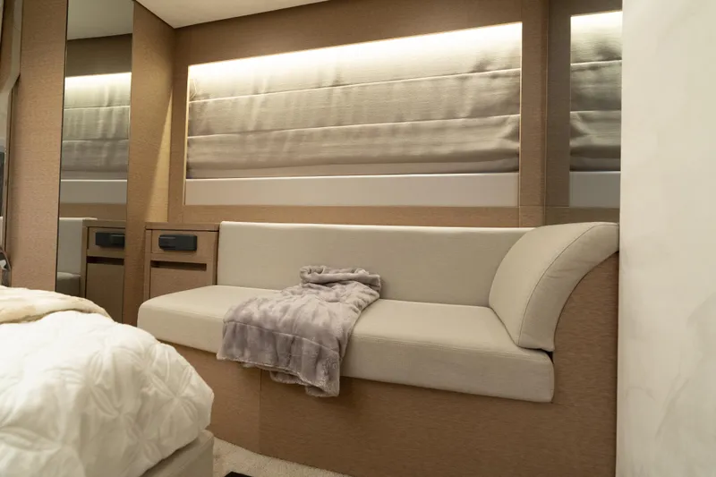 Motivated Seller Yacht Photos Pics Luxurious interior of 2019 Prestige 520 yacht with elegant seating and soft lighting.