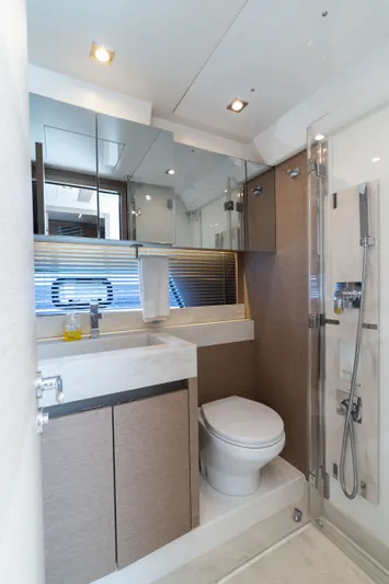 Motivated Seller Yacht Photos Pics Luxurious bathroom in 2019 Prestige 520 yacht with modern fixtures and sleek design.
