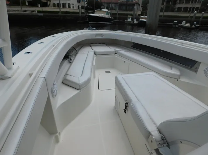  Yacht Photos Pics 2013 Hydra-Sports 4200 Siesta boat interior with white seating and storage compartments.