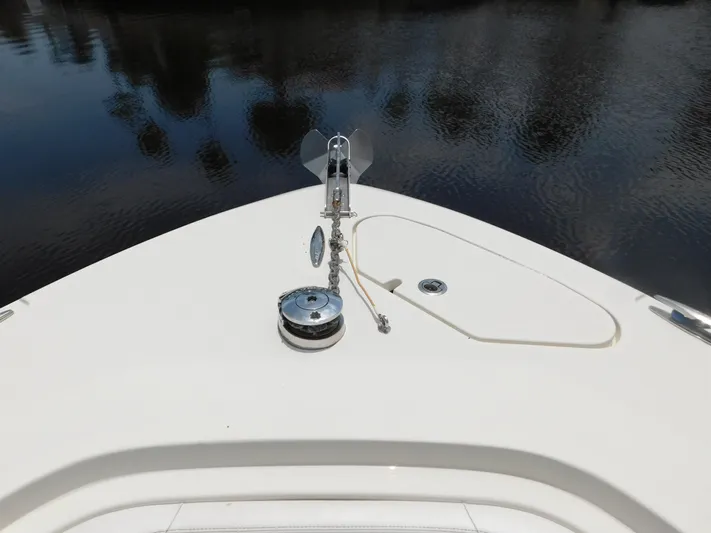  Yacht Photos Pics Bow of 2013 Hydra-Sports 4200 Siesta boat with anchor and calm water reflection.