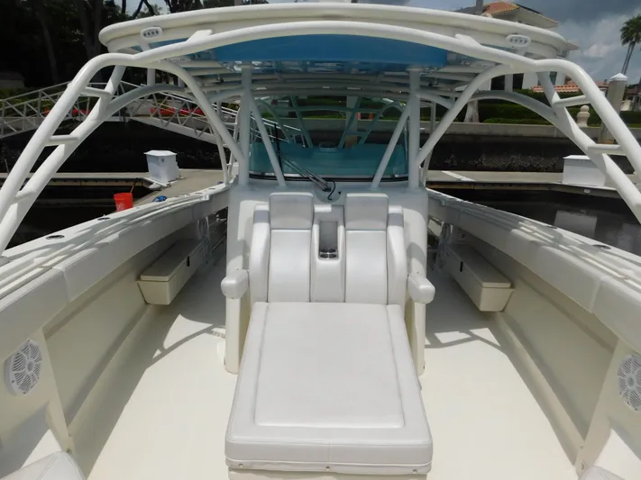  Yacht Photos Pics 2013 Hydra-Sports 4200 Siesta boat interior with white seating and blue canopy.