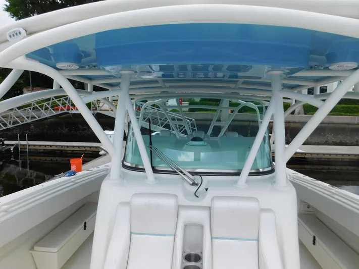  Yacht Photos Pics 2013 Hydra-Sports 4200 Siesta boat interior with seating and blue canopy.