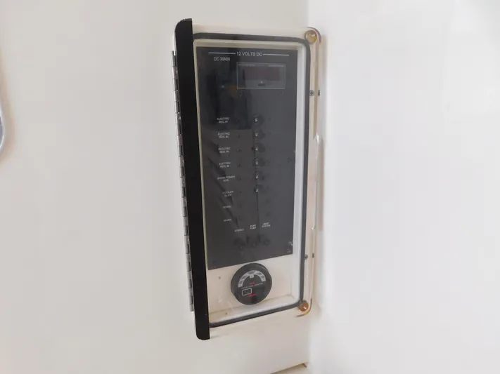  Yacht Photos Pics Control panel on a 2013 Hydra-Sports 4200 Siesta boat, featuring switches and a gauge.