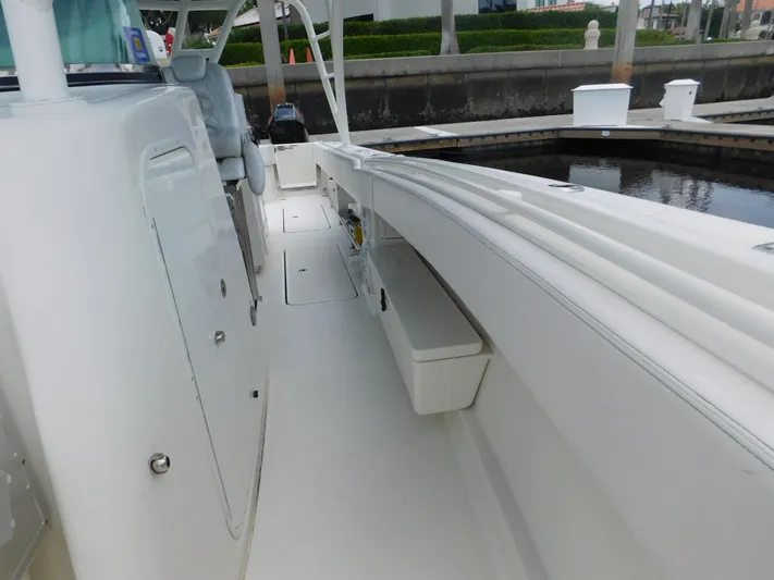  Yacht Photos Pics 2013 Hydra-Sports 4200 Siesta boat deck, featuring sleek white design and spacious layout.
