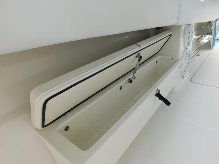  Yacht Photos Pics Open storage compartment on 2013 Hydra-Sports 4200 Siesta boat interior.