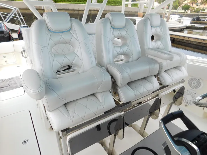  Yacht Photos Pics Luxurious white leather seats on a 2013 Hydra-Sports 4200 Siesta boat.