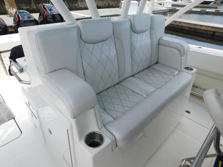  Yacht Photos Pics Luxurious seating on 2013 Hydra-Sports 4200 Siesta boat with diamond-stitched upholstery.