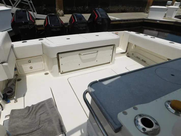  Yacht Photos Pics 2013 Hydra-Sports 4200 Siesta boat interior with seating and storage compartments.