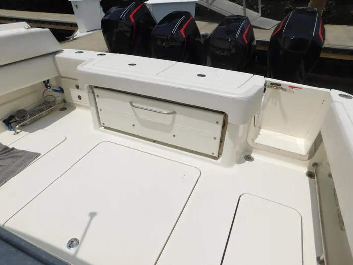  Yacht Photos Pics 2013 Hydra-Sports 4200 Siesta boat deck with storage and multiple outboard engines.