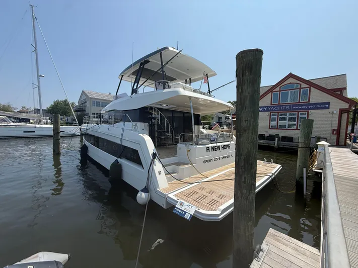 A New Hope Yacht Photos Pics 2018 Fountaine Pajot MY 44 yacht docked at marina, rear view.