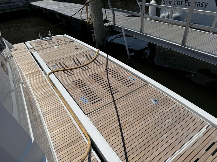 A New Hope Yacht Photos Pics 2018 Fountaine Pajot MY 44 yacht deck with wooden finish at marina.