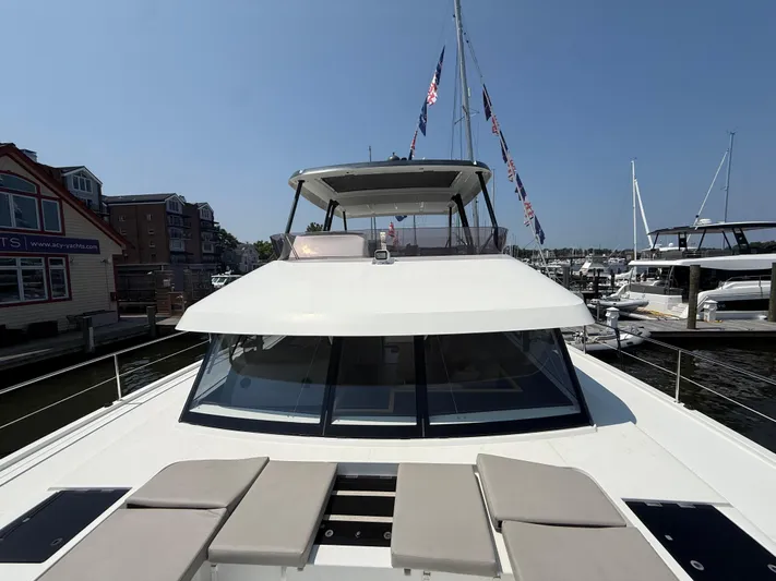 A New Hope Yacht Photos Pics 2018 Fountaine Pajot MY 44 yacht docked at marina, showcasing sleek design and spacious deck.