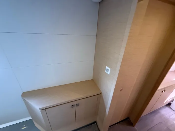 A New Hope Yacht Photos Pics Interior of 2018 Fountaine Pajot MY 44 yacht, featuring sleek wooden cabinetry.