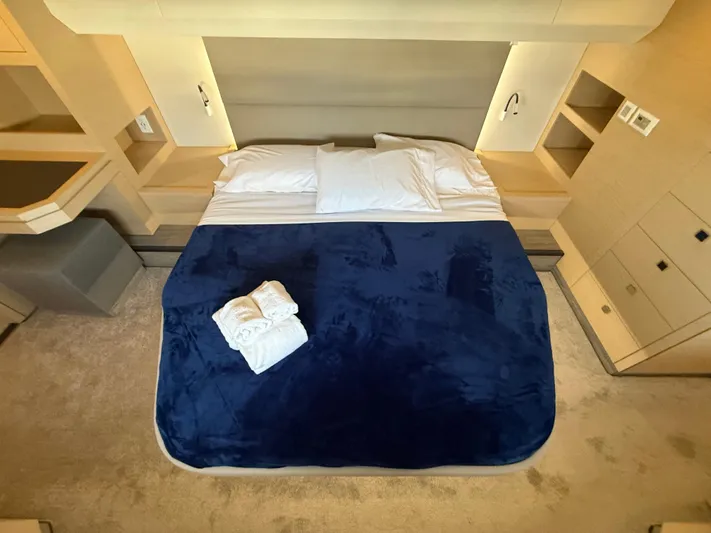 A New Hope Yacht Photos Pics Luxurious bedroom interior of 2018 Fountaine Pajot MY 44 yacht with blue bedding.