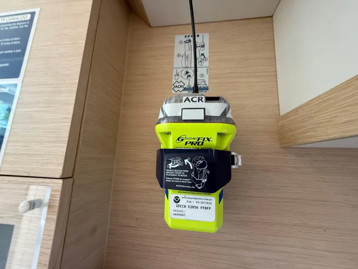 A New Hope Yacht Photos Pics Emergency beacon on 2018 Fountaine Pajot MY 44 yacht, mounted on wooden panel.