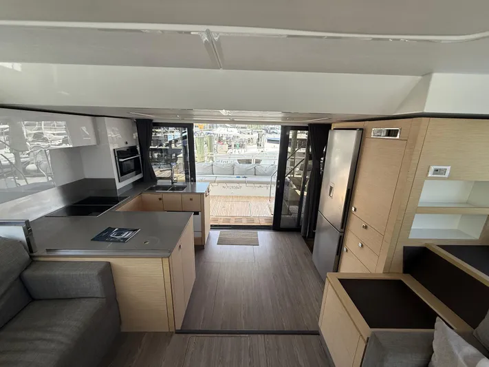 A New Hope Yacht Photos Pics Interior of 2018 Fountaine Pajot MY 44 yacht, featuring modern kitchen and spacious layout.