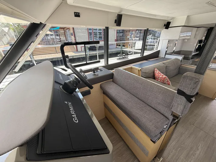 A New Hope Yacht Photos Pics Interior of 2018 Fountaine Pajot MY 44 yacht with modern helm and seating area.