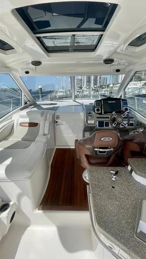 Yacht Photos Pics Interior of 2010 Chaparral Premiere 400 yacht with modern helm and seating.