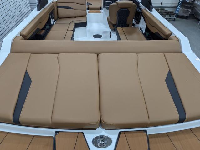 2025 Axis Wake Research T220 boat interior with tan seating and modern design.