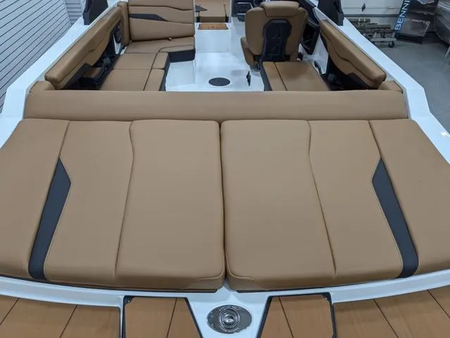 2025 Axis Wake Research T220 boat interior with tan seating and modern design.