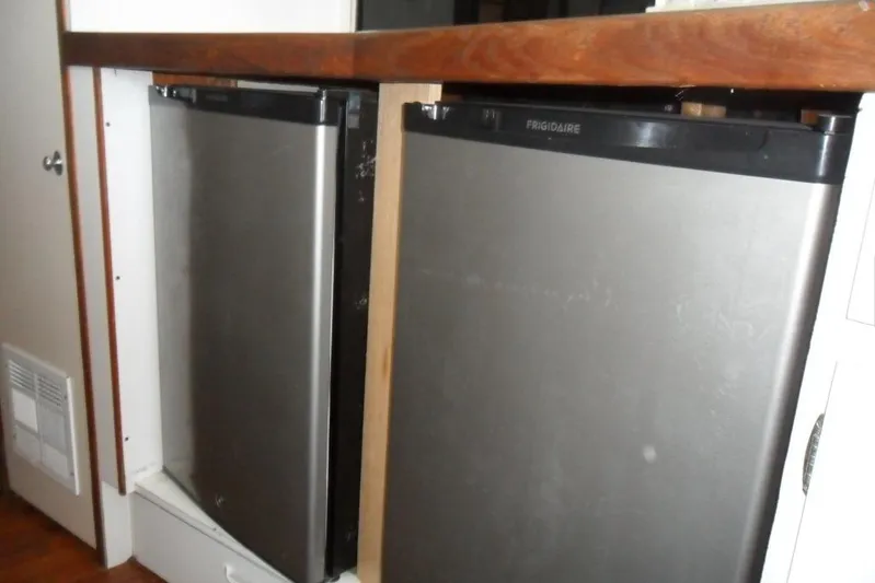  Yacht Photos Pics Frigidaire refrigerators in 1979 Bertram 46.6 Sport Fisher yacht kitchen.