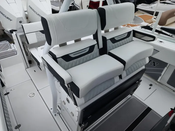  Yacht Photos Pics 2023 Blackfin 272 CC boat seating with modern design and comfortable upholstery.