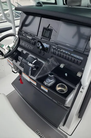  Yacht Photos Pics 2023 Blackfin 272 CC boat dashboard with advanced controls and navigation systems.