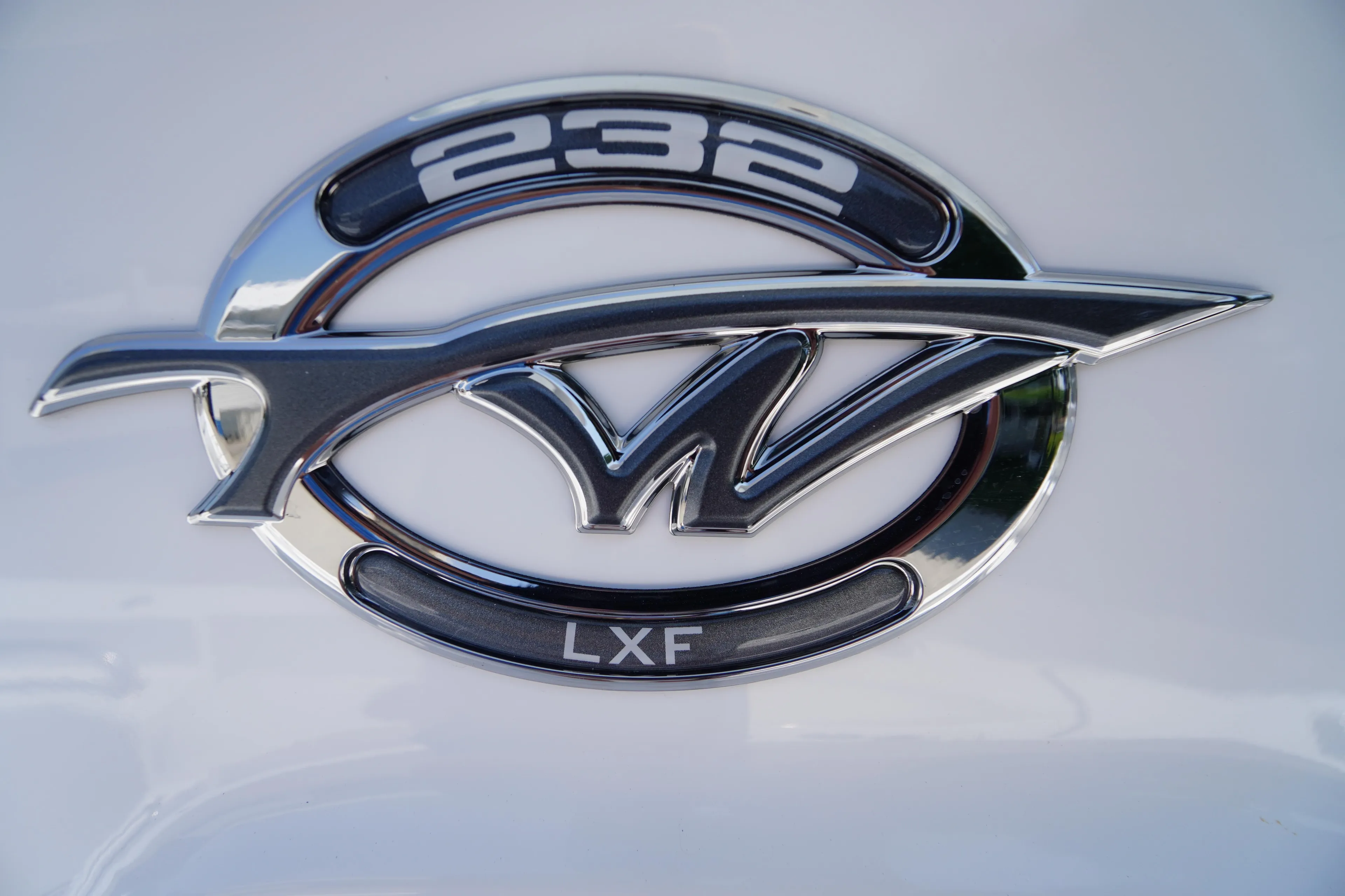 2026 Tidewater 232 LXF logo emblem on a sleek white surface.