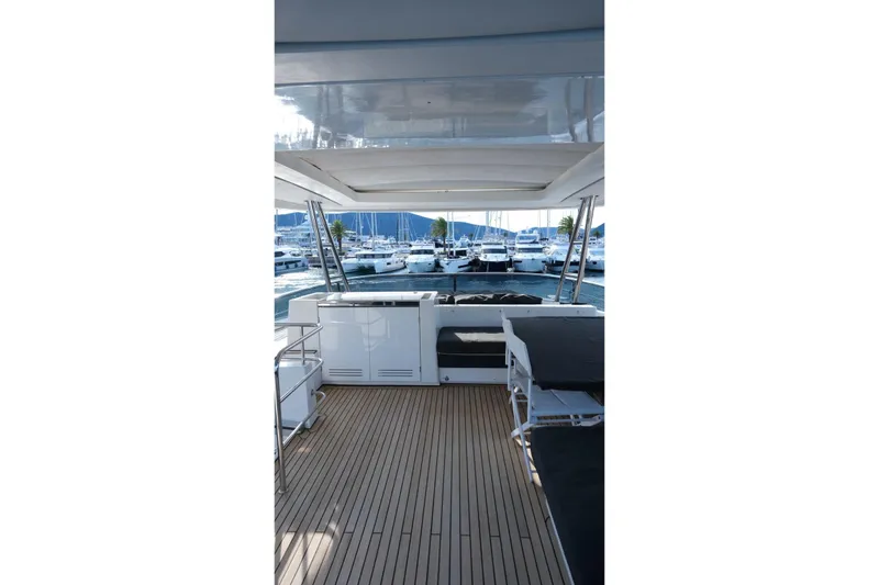  Yacht Photos Pics Luxurious 2020 Lagoon 630 MY yacht interior with marina view.