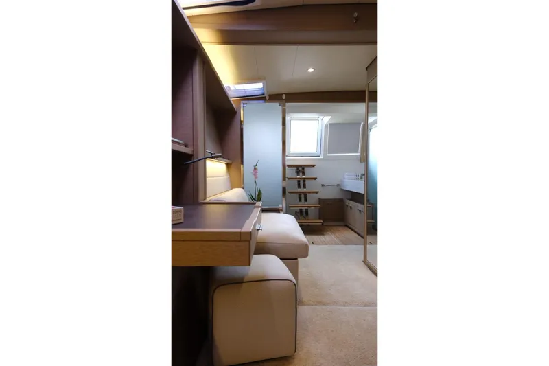  Yacht Photos Pics Luxurious interior of 2020 Lagoon 630 MY yacht with modern furnishings and natural light.