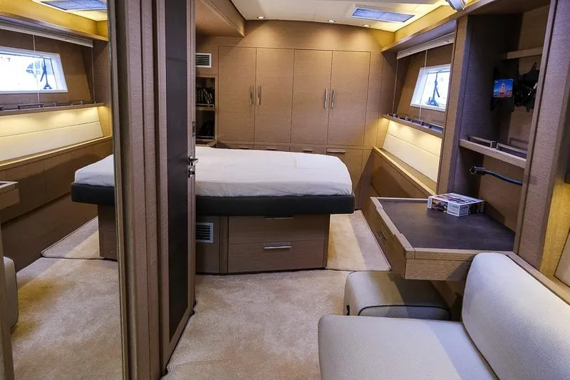  Yacht Photos Pics Luxurious interior of 2020 Lagoon 630 MY yacht with modern bedroom design.