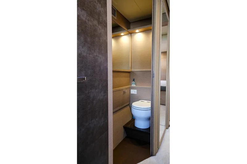  Yacht Photos Pics Luxurious bathroom interior of 2020 Lagoon 630 MY yacht with modern fixtures.