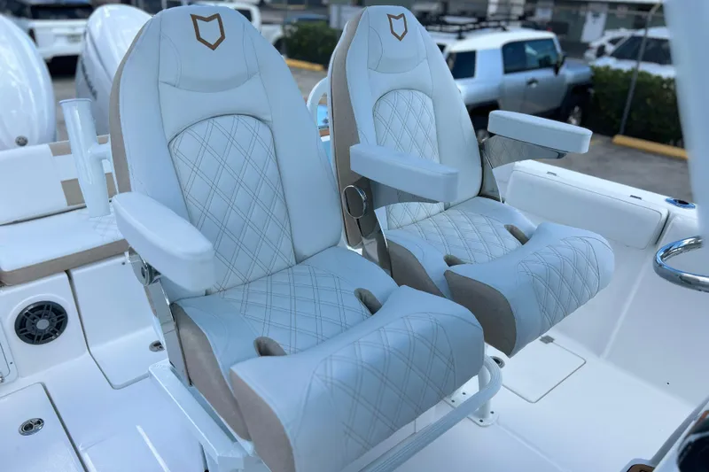  Yacht Photos Pics Luxury seating on 2026 Sea Fox 268 Commander boat, featuring elegant design and comfort.