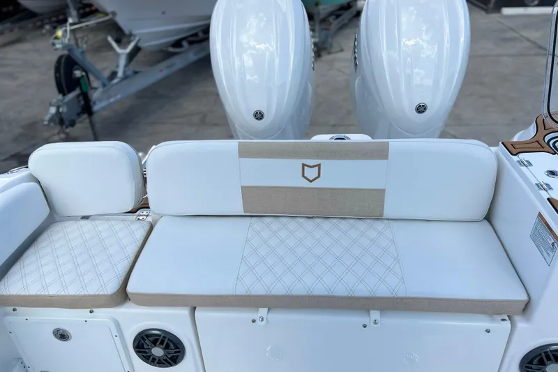  Yacht Photos Pics 2026 Sea Fox 268 Commander boat seating with dual engines in the background.