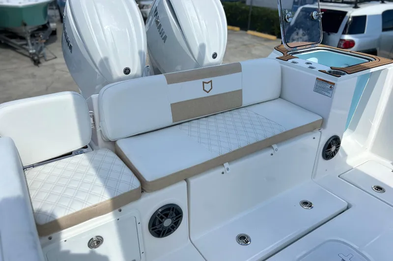  Yacht Photos Pics 2026 Sea Fox 268 Commander boat seating area with dual engines and modern design.