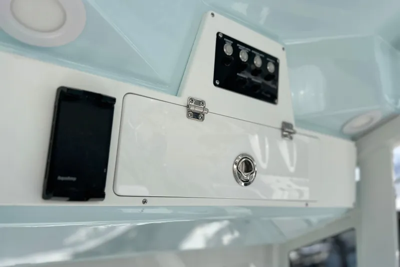  Yacht Photos Pics 2026 Sea Fox 268 Commander dashboard with control panel and storage compartment.