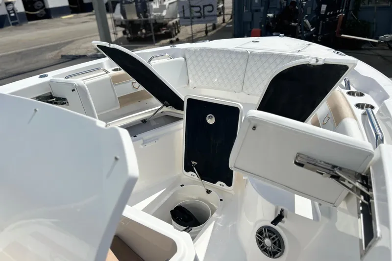  Yacht Photos Pics 2026 Sea Fox 268 Commander boat interior with open storage compartments and seating.