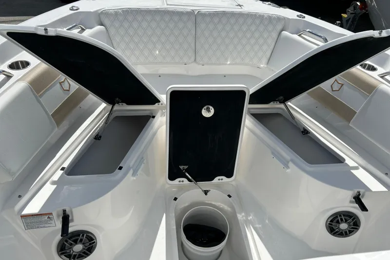  Yacht Photos Pics 2026 Sea Fox 268 Commander boat interior with open storage compartments and seating.