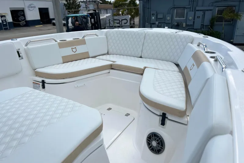  Yacht Photos Pics 2026 Sea Fox 268 Commander boat interior with cushioned seating and modern design.