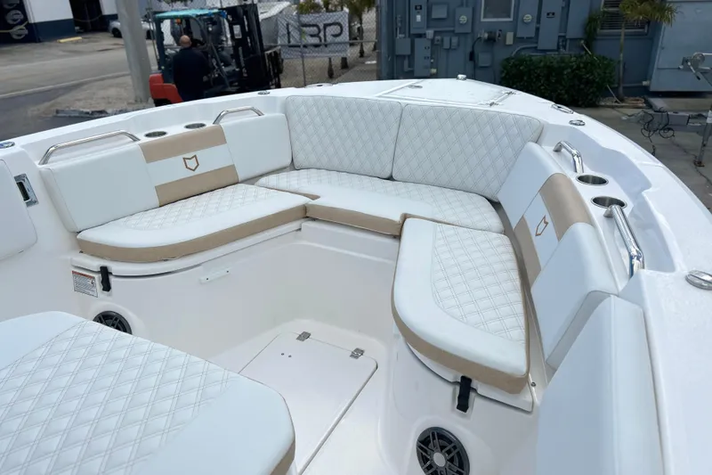  Yacht Photos Pics 2026 Sea Fox 268 Commander boat interior with cushioned seating and cup holders.
