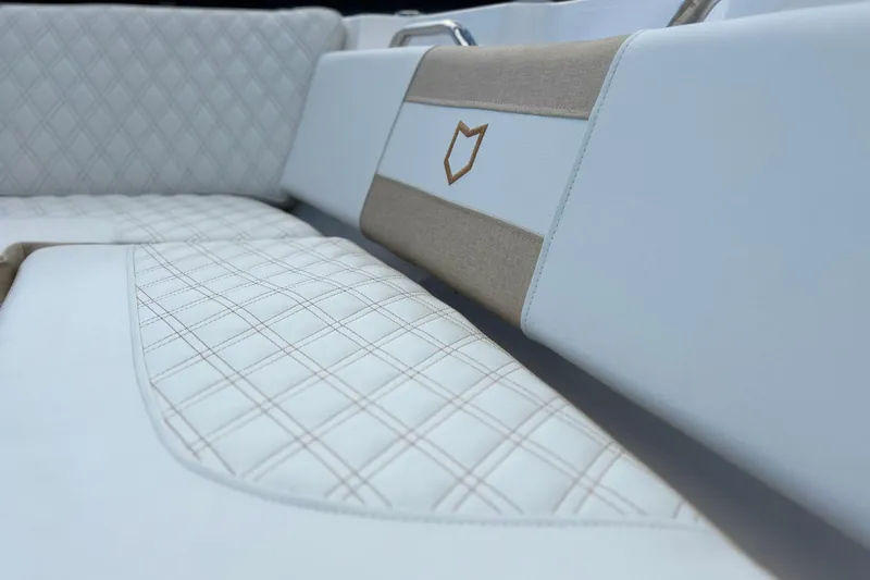  Yacht Photos Pics 2026 Sea Fox 268 Commander boat interior with elegant diamond-stitched upholstery.