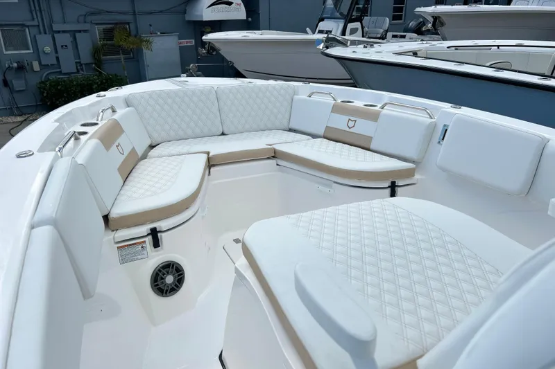  Yacht Photos Pics 2026 Sea Fox 268 Commander boat interior with cushioned seating and modern design.