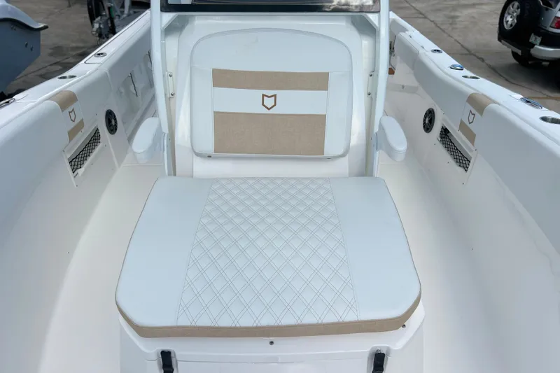  Yacht Photos Pics 2026 Sea Fox 268 Commander boat interior with cushioned seating and elegant design.